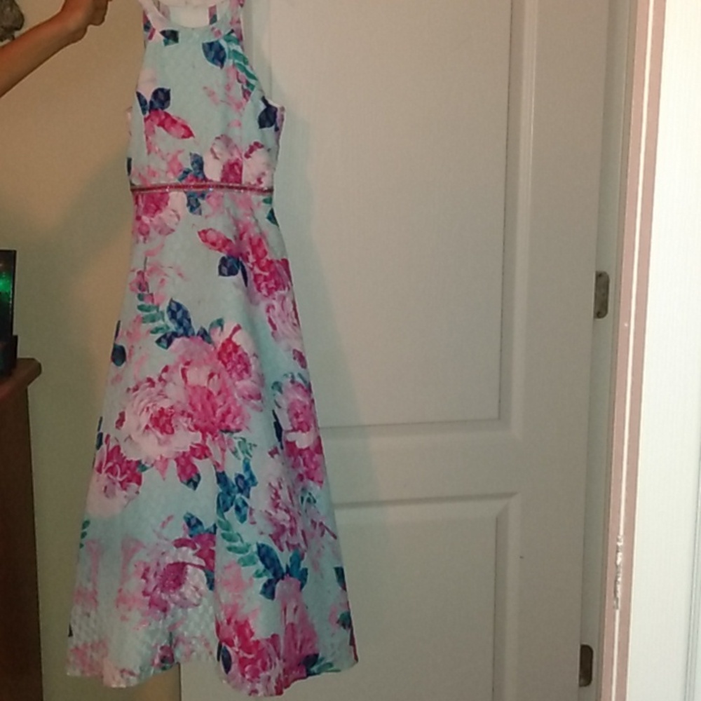 Beautiful girl long formal dress with beaded belt